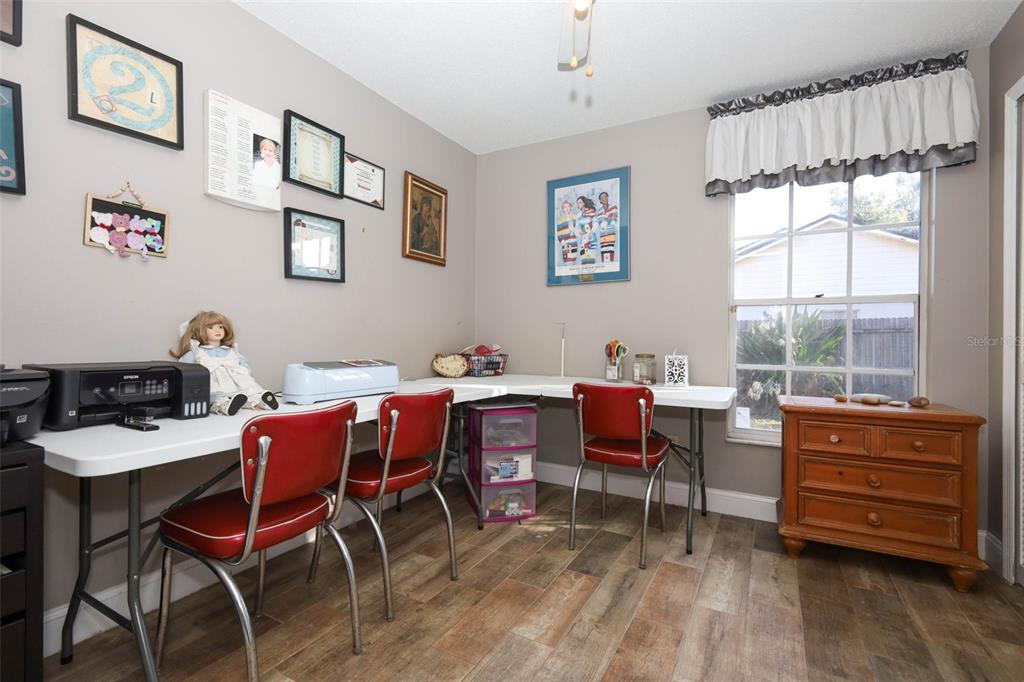 1531 Lawndale Circle Winter Park, FL 32792 - Photo 26 of 44 a view of a dining room with furniture window and wooden floor