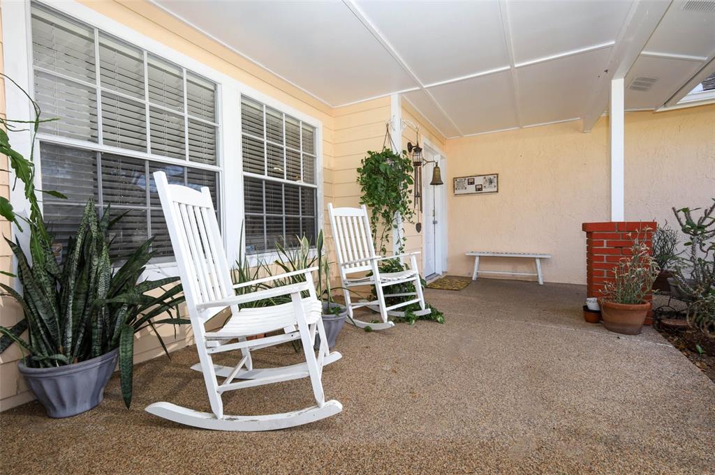 1531 Lawndale Circle Winter Park, FL 32792 - Photo 3 of 44 a view of a chairs and table in backyard