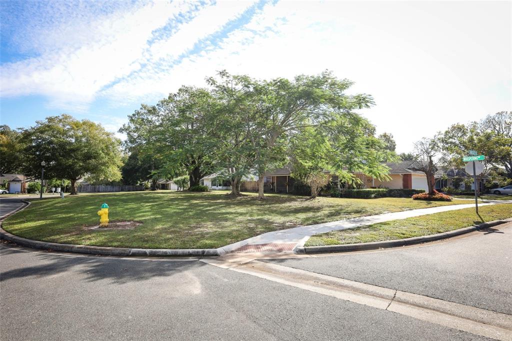 1531 Lawndale Circle Winter Park, FL 32792 - Photo 34 of 44 a view of a playground with basketball court