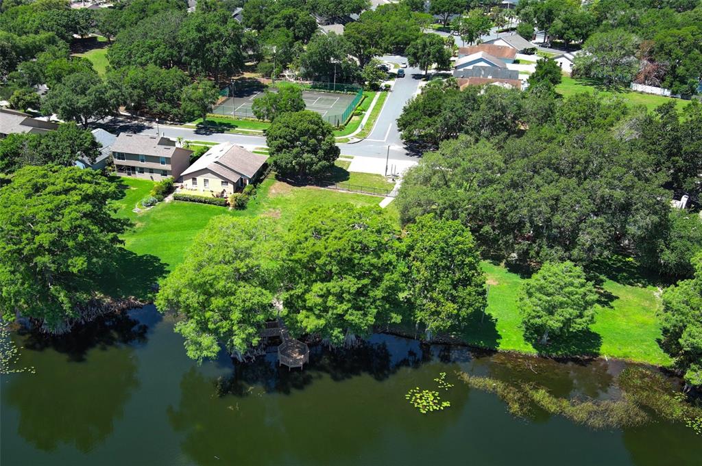 1531 Lawndale Circle Winter Park, FL 32792 - Photo 42 of 44 an aerial view of a house with garden space lake view and lake view