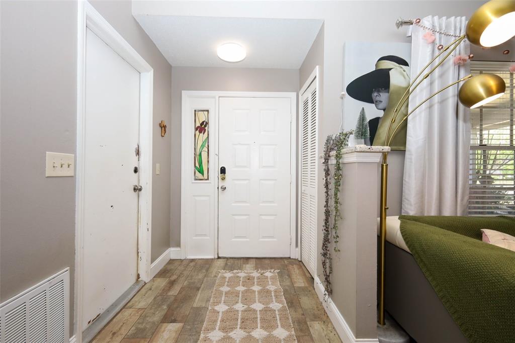 1531 Lawndale Circle Winter Park, FL 32792 - Photo 5 of 44 a view of hallway with furniture and a window