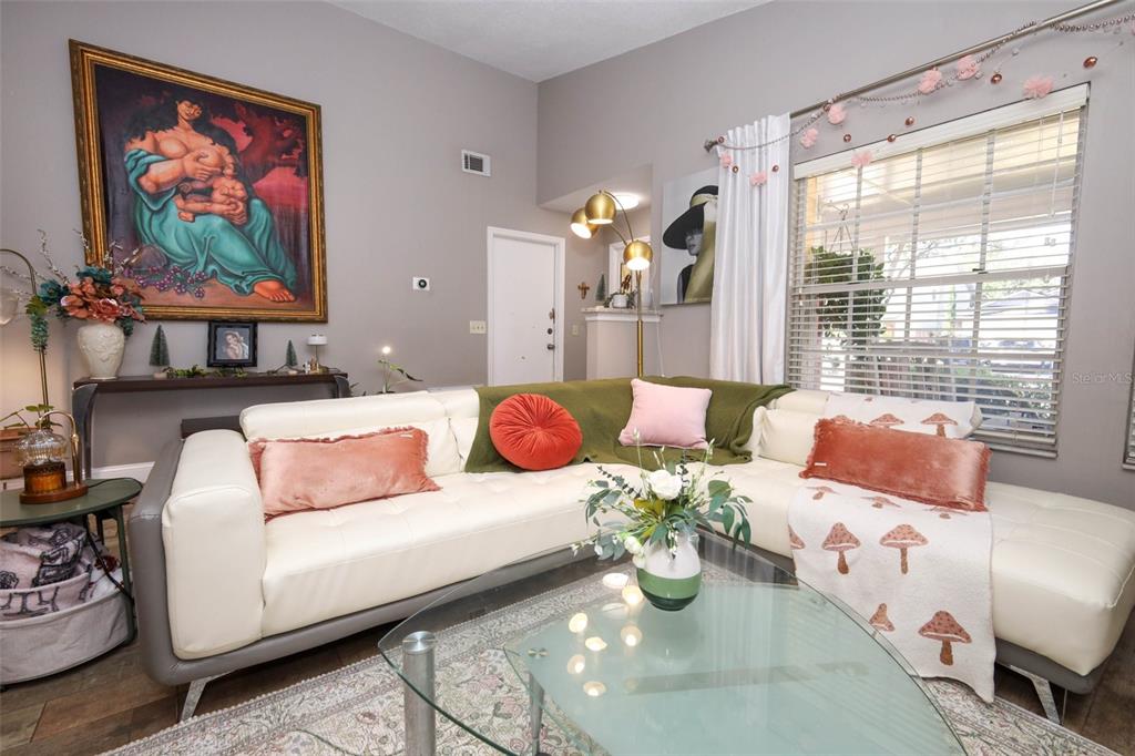 1531 Lawndale Circle Winter Park, FL 32792 - Photo 7 of 44 a living room with furniture and a large window