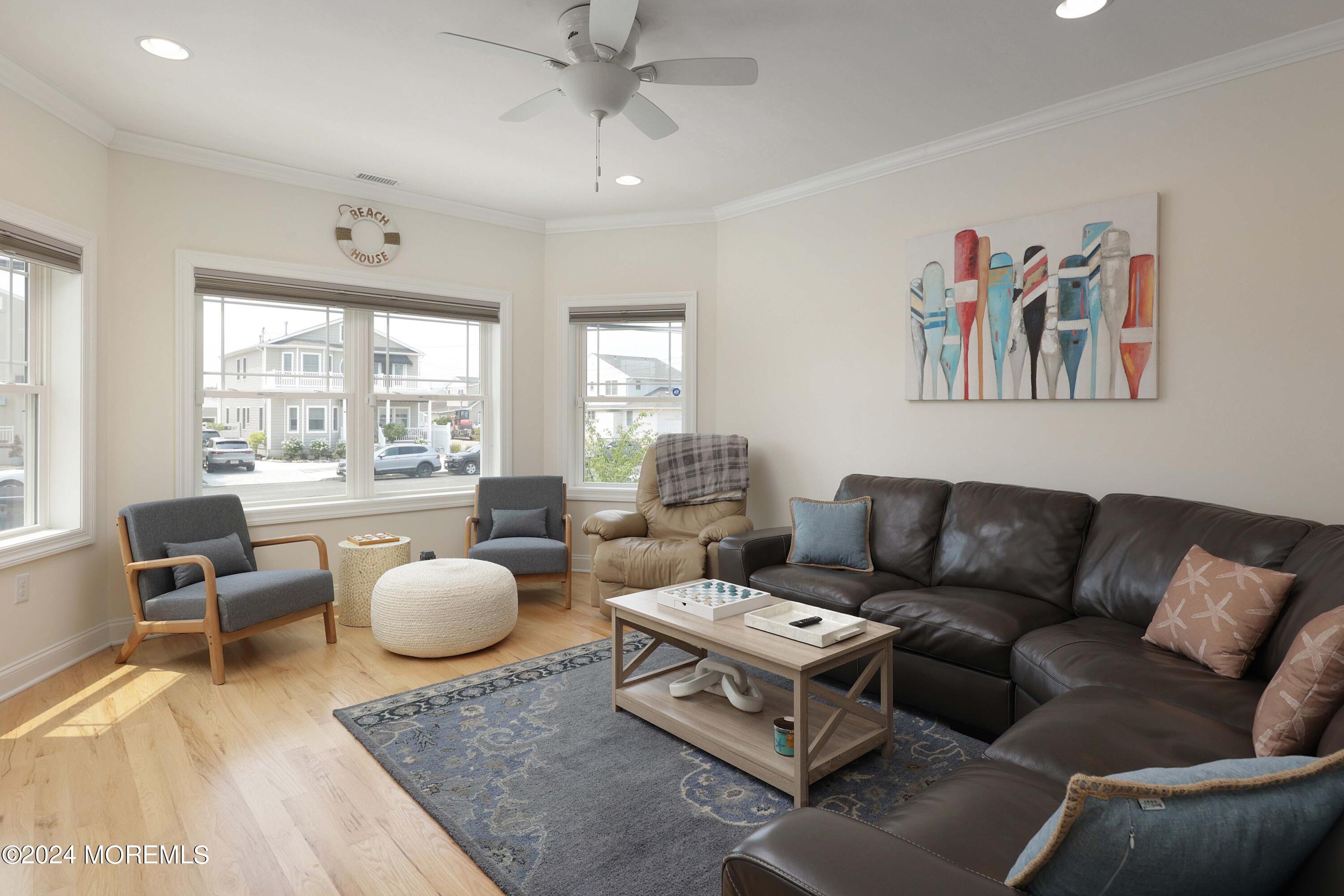 1607 Baltimore Avenue Lavallette, NJ 08735 - Photo 11 of 28 a living room with furniture and a large window