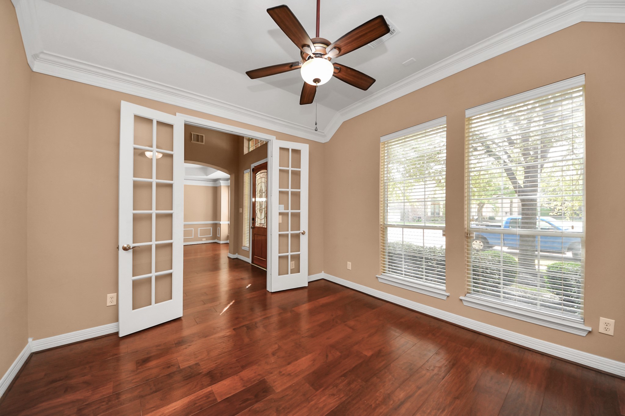 17618 Raven Canyon Lane Houston, TX 77095 - Photo 4 of 45 A versatile room with French doors and plenty of natural light, perfect for a home office or study space.
