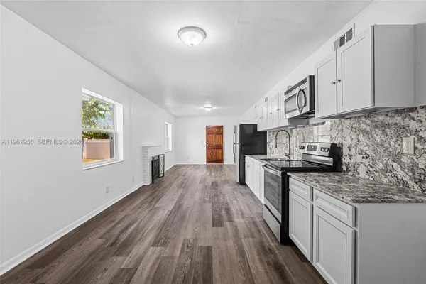a view of a livingroom with a window