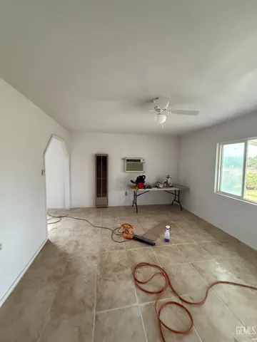 a kitchen with stainless steel appliances a sink and cabinets