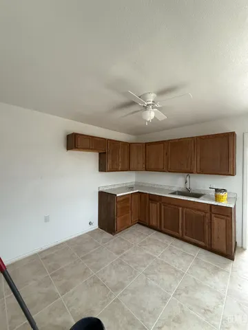 a bathroom with a toilet a sink and bathtub