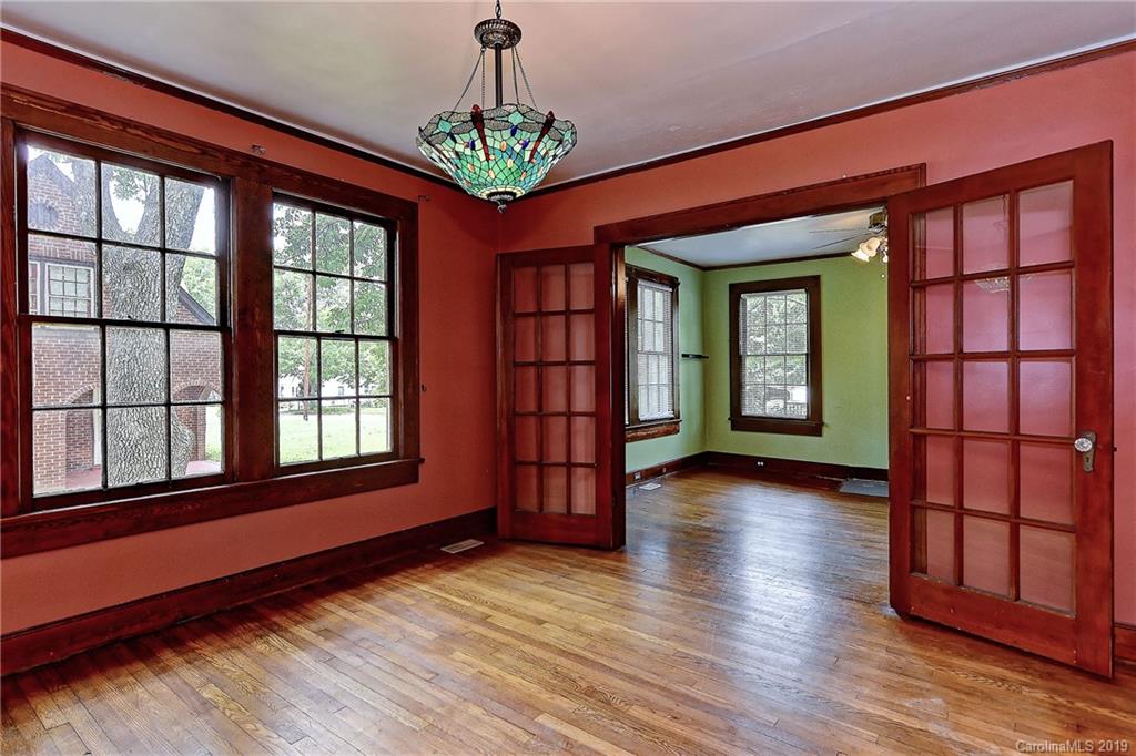 508 Ford Street Kannapolis, NC 28083 - Photo 5 of 13 wooden floor in an empty room with a window