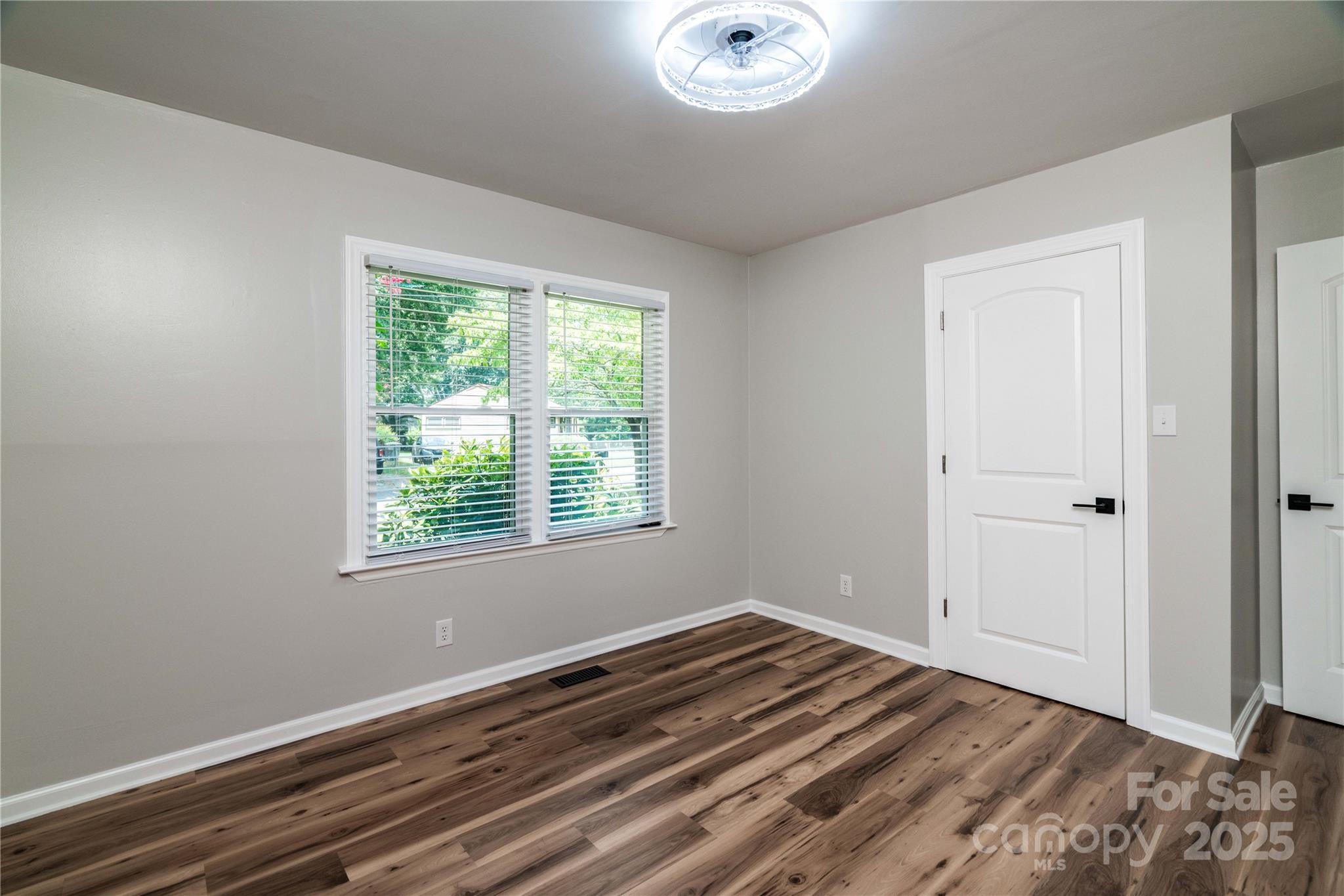 305 Linden Circle Gastonia, NC 28054 - Photo 16 of 37 a view of a room with wooden floor and window