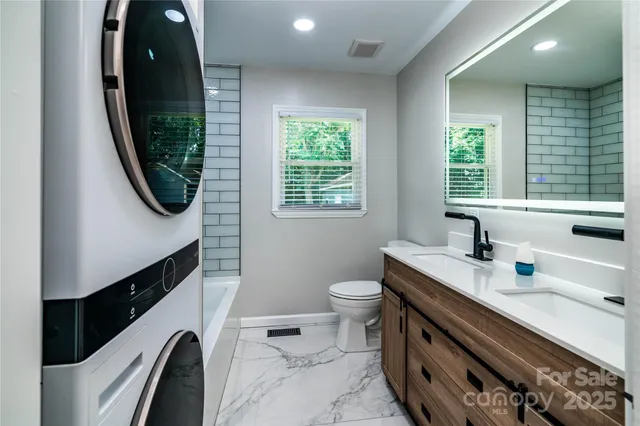 a kitchen with a sink and a window
