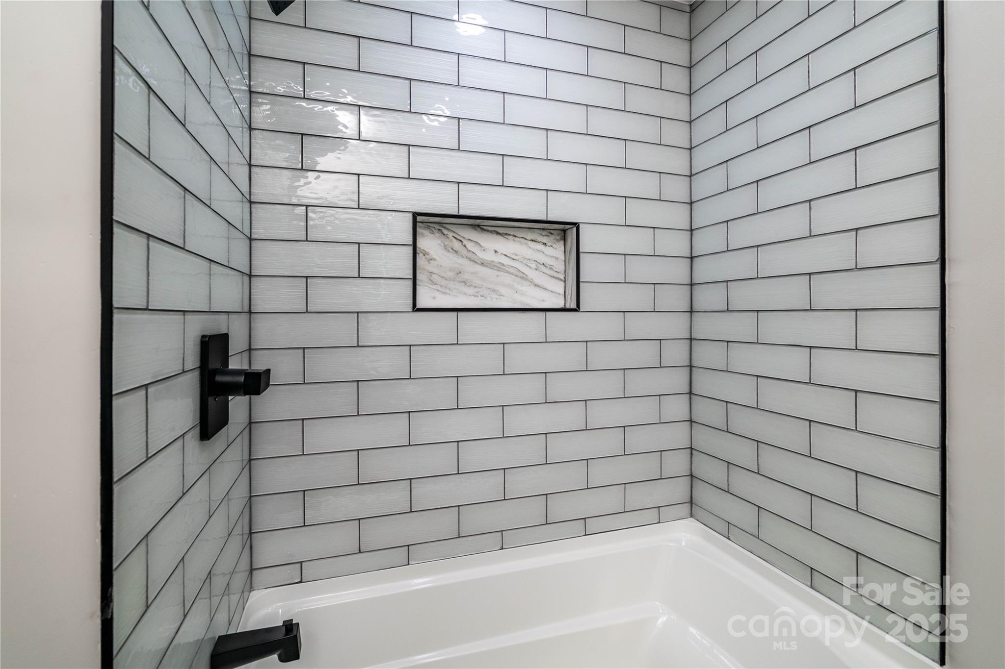 305 Linden Circle Gastonia, NC 28054 - Photo 22 of 37 a bathroom with a bathtub and shower