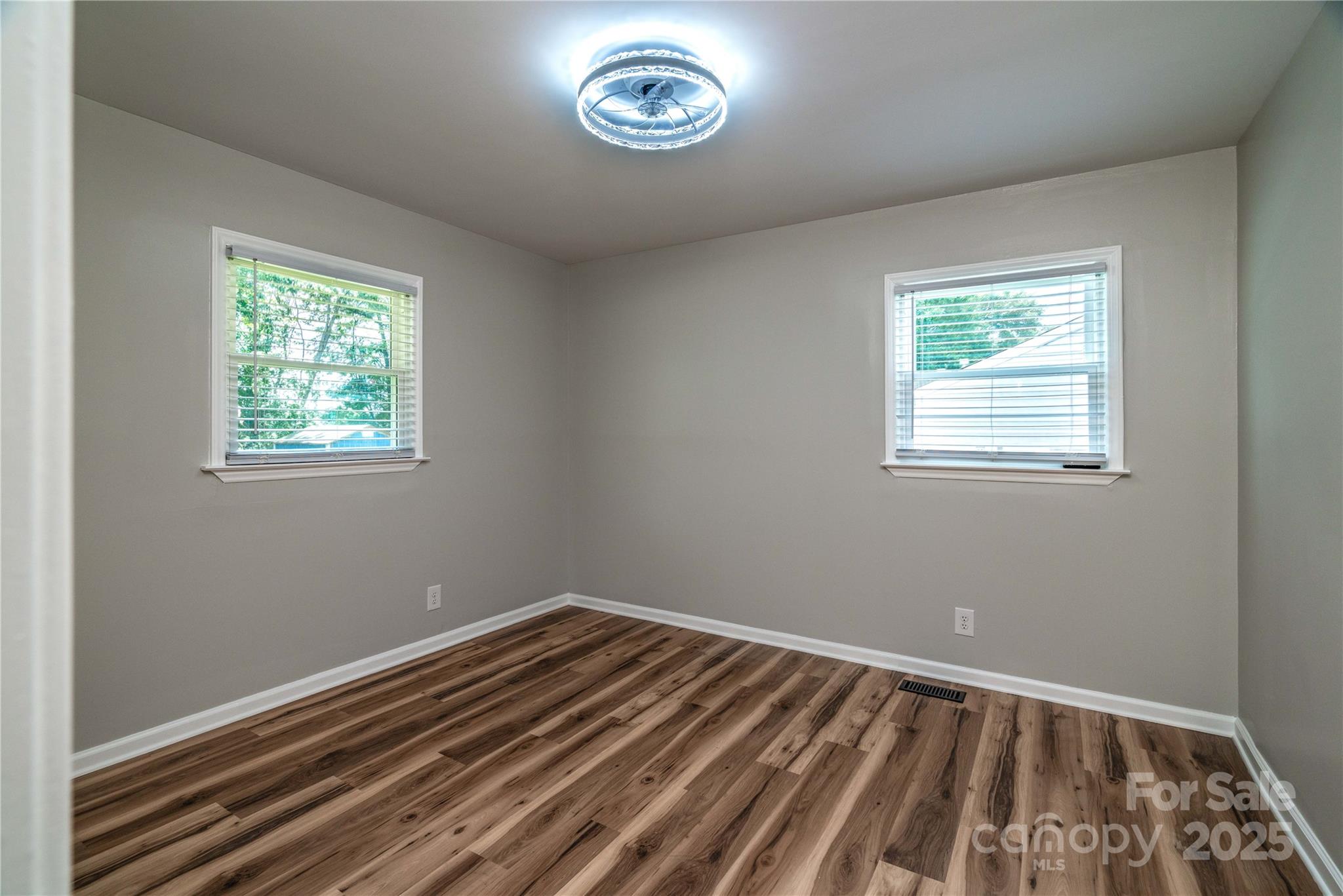 305 Linden Circle Gastonia, NC 28054 - Photo 24 of 37 a view of a room with wooden floor and window