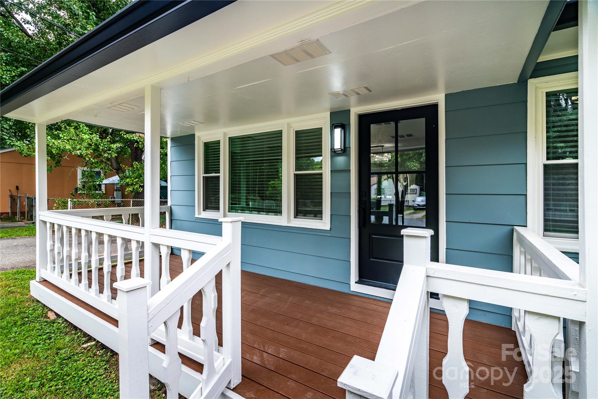 305 Linden Circle Gastonia, NC 28054 - Photo 25 of 37 a view of deck with a large window and wooden floor
