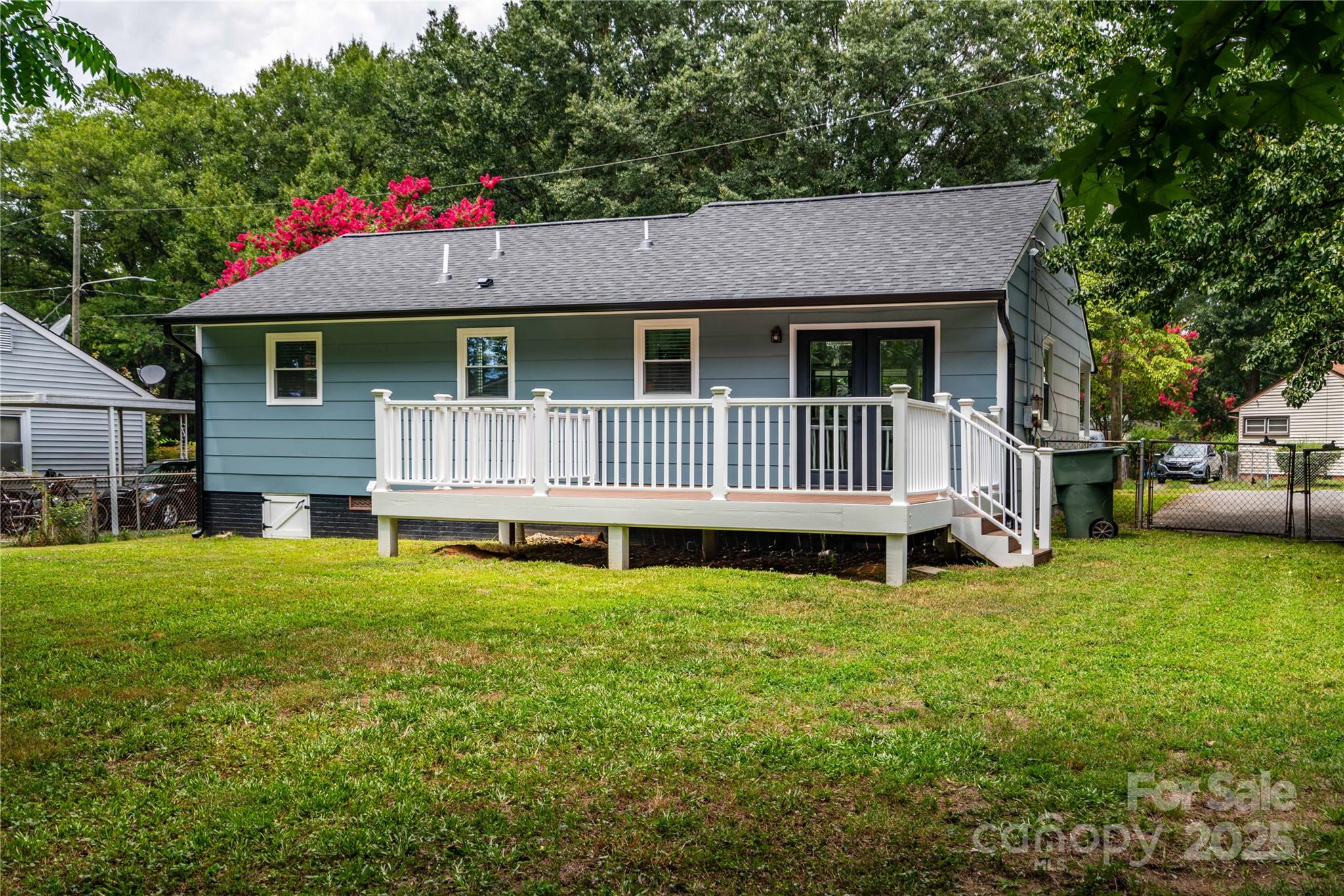 305 Linden Circle Gastonia, NC 28054 - Photo 26 of 37 a front view of a house with garden