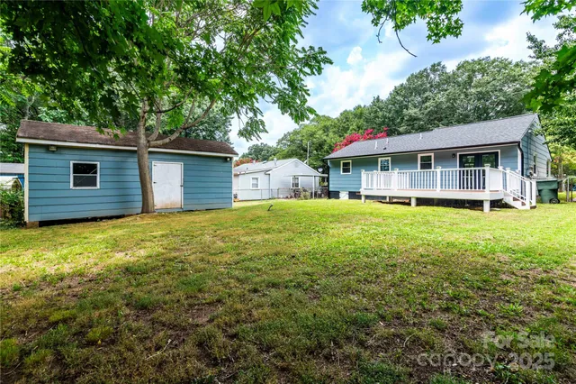 a view of deck with wooden floor and fence