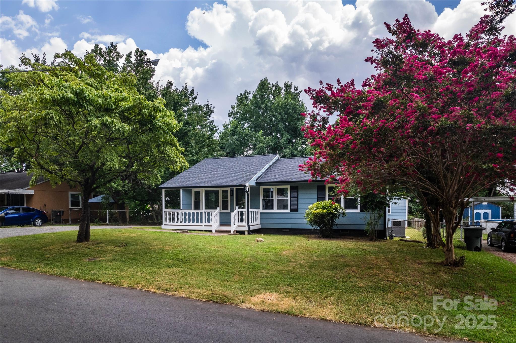 305 Linden Circle Gastonia, NC 28054 - Photo 34 of 37 a front view of a house with garden