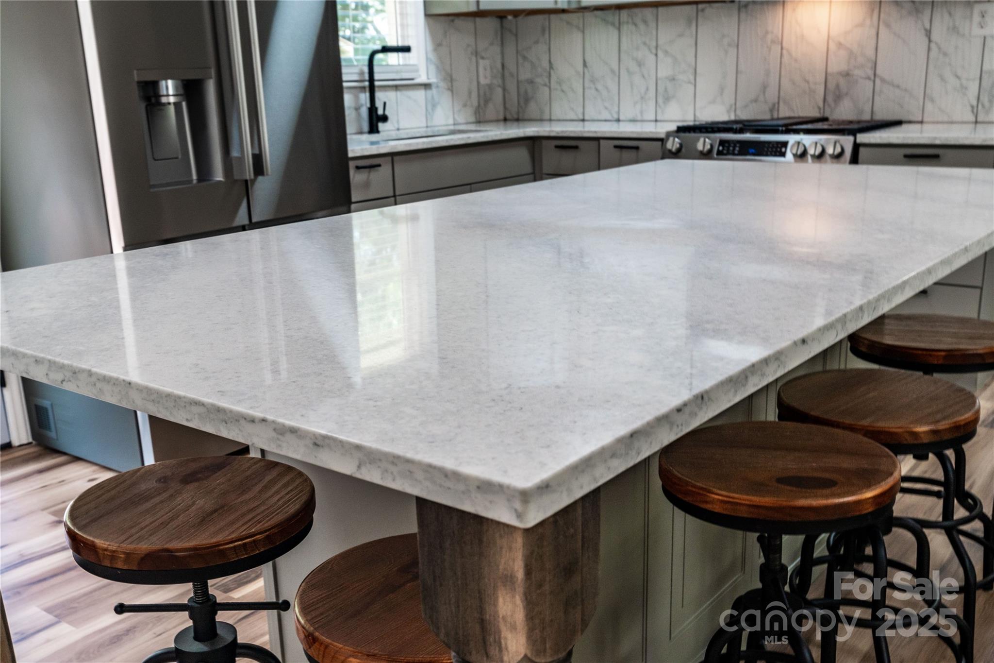 305 Linden Circle Gastonia, NC 28054 - Photo 8 of 37 a kitchen with a table and chairs