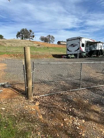 a view of a yard with an outdoor space