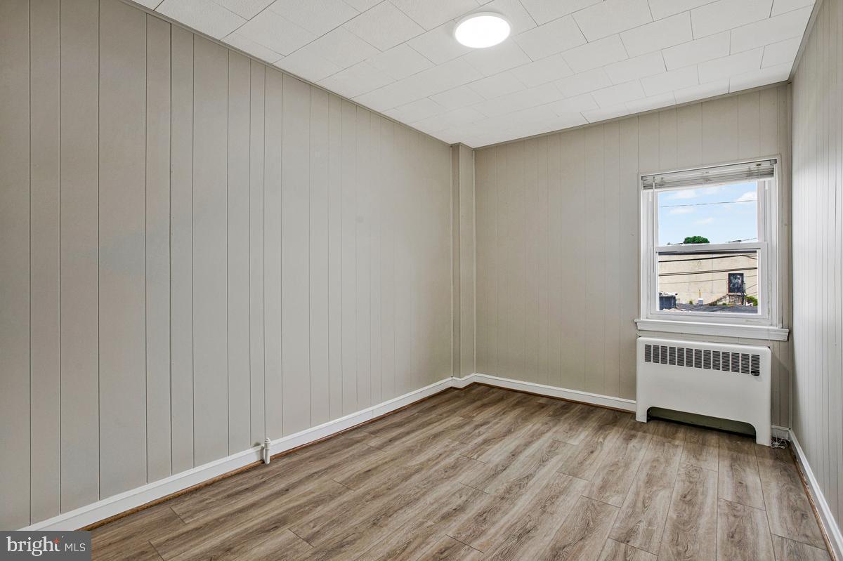 3040 Federal Street Baltimore, MD 21213 - Photo 22 of 41 a view of empty room with wooden floor