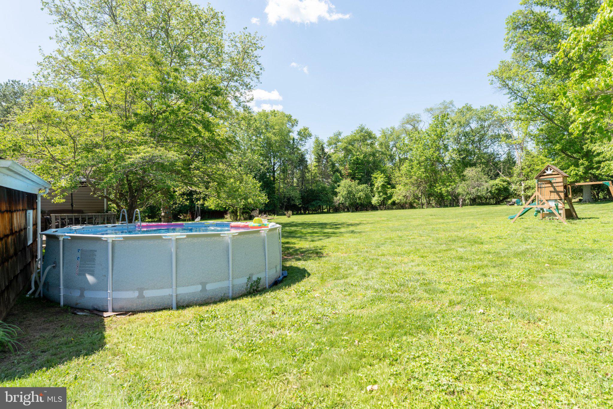 69 Manners Road Ringoes, NJ 08551 - Photo 36 of 42 Sunny backyard oasis with pool.