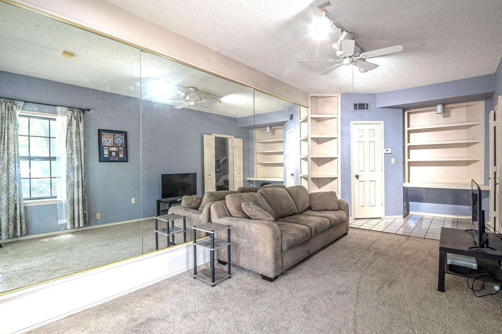 4516 Forestgate Drive Arlington, TX 76017 - Photo 15 of 23 a living room with furniture and a large window