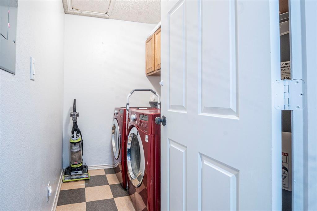 4516 Forestgate Drive Arlington, TX 76017 - Photo 20 of 23 a view of front door with washer and dryer