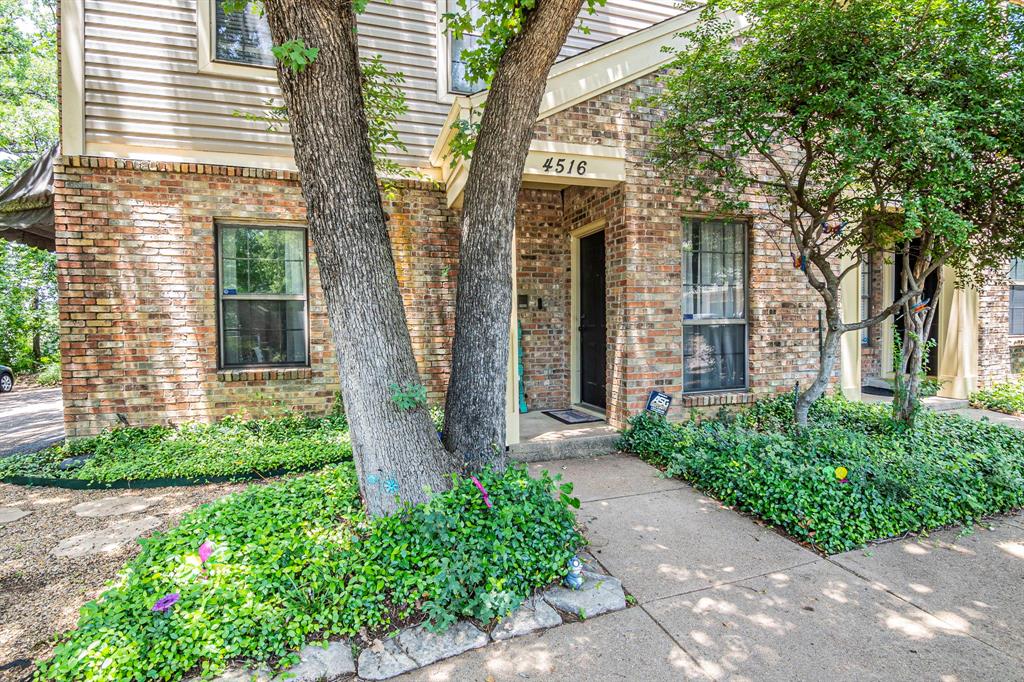 4516 Forestgate Drive Arlington, TX 76017 - Photo 22 of 23 front view of a house with a yard