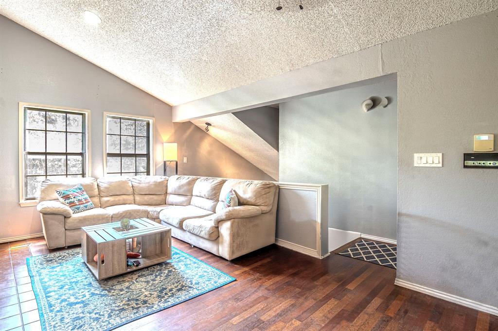 4516 Forestgate Drive Arlington, TX 76017 - Photo 4 of 23 a living room with furniture and a window