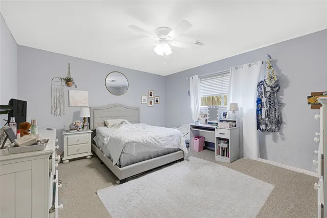 a bathroom with a bathtub and a toilet