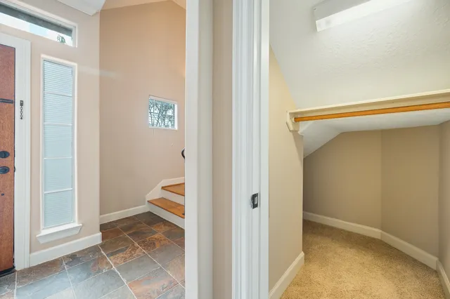 a bathroom with a sink a mirror and a toilet