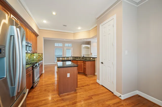 a view of a house with a yard and garage