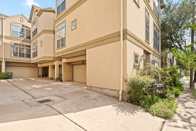 a view of a house with a street