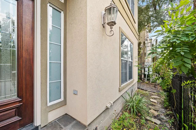 a view of a door and chair in the balcony