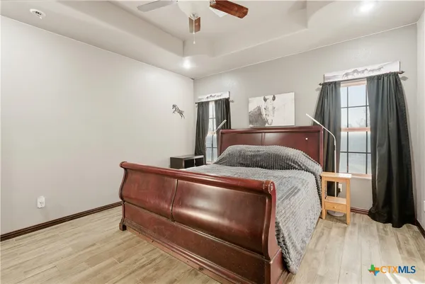 a bed room with a bed and a window