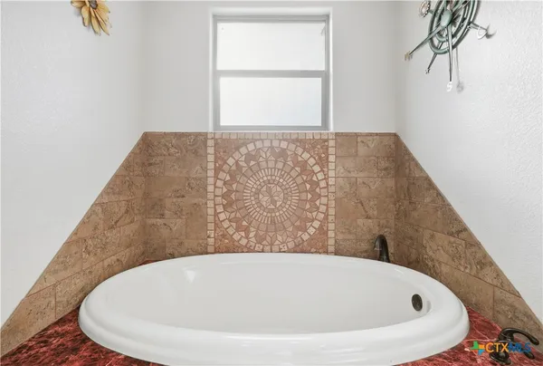 a bathroom with a bathtub