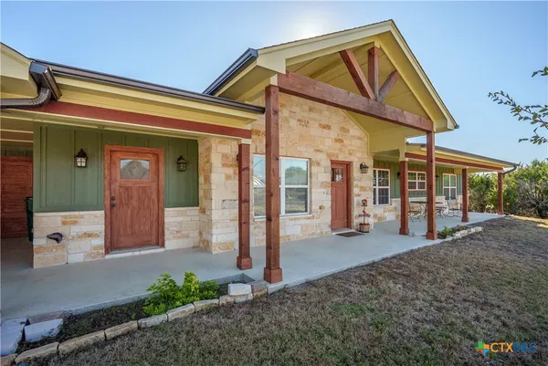 a view of a house with a porch