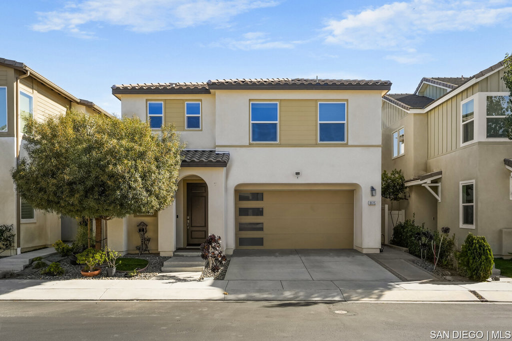 8615 Chaparral Way Santee, CA 92071 - Photo 2 of 46 a front view of a house with yard
