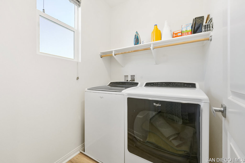 8615 Chaparral Way Santee, CA 92071 - Photo 32 of 46 a utility room with dryer and washer