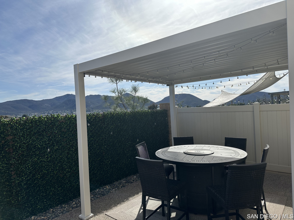 8615 Chaparral Way Santee, CA 92071 - Photo 34 of 46 a table in a house with a table and chairs