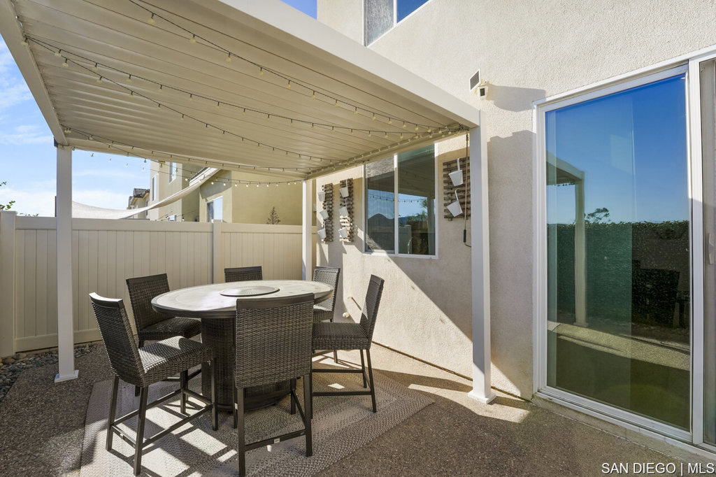 8615 Chaparral Way Santee, CA 92071 - Photo 36 of 46 a view of a dining room with furniture window and outside view