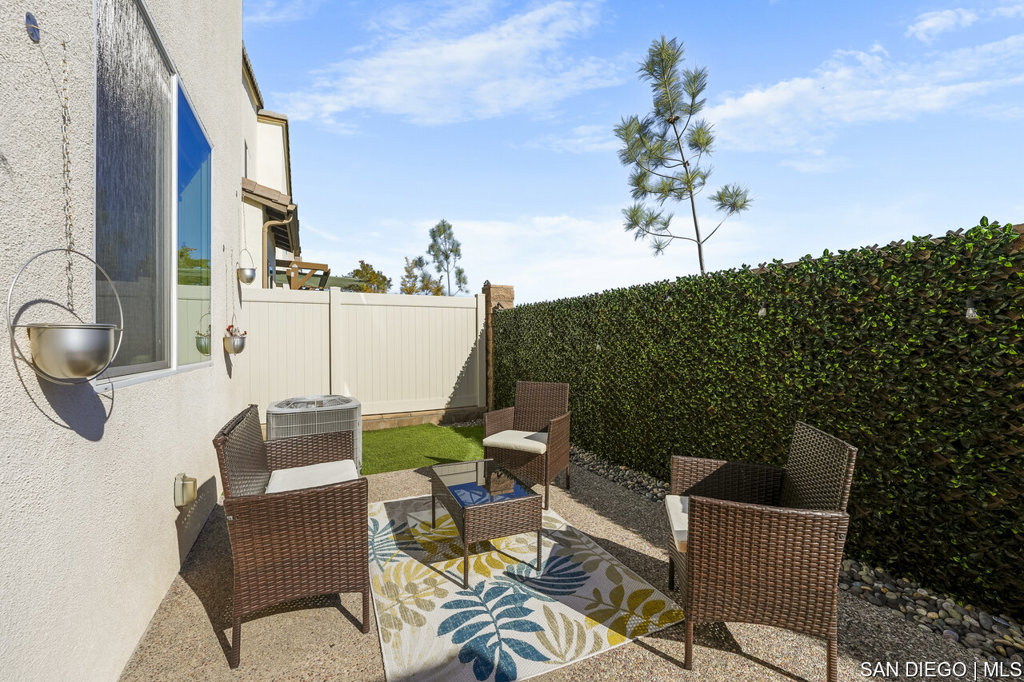 8615 Chaparral Way Santee, CA 92071 - Photo 38 of 46 a balcony with outdoor seating and plants