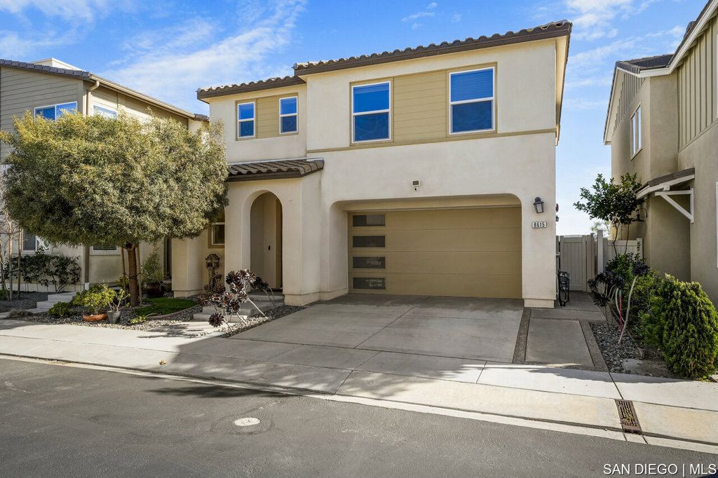 8615 Chaparral Way Santee, CA 92071 - Photo 4 of 46 a front view of a house with yard