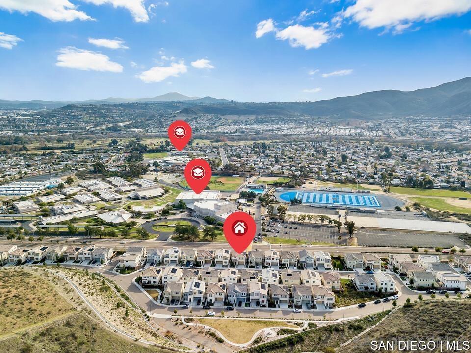 8615 Chaparral Way Santee, CA 92071 - Photo 41 of 46 a view of swimming pool with a yard and mountain view in back