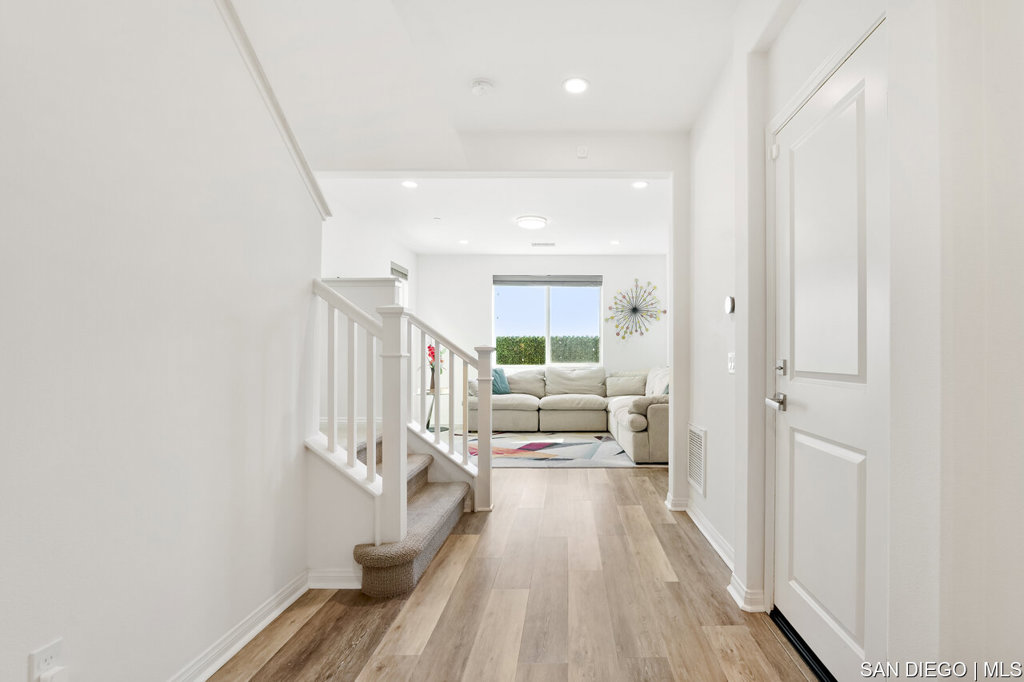 8615 Chaparral Way Santee, CA 92071 - Photo 8 of 46 a living room with furniture and wooden floor