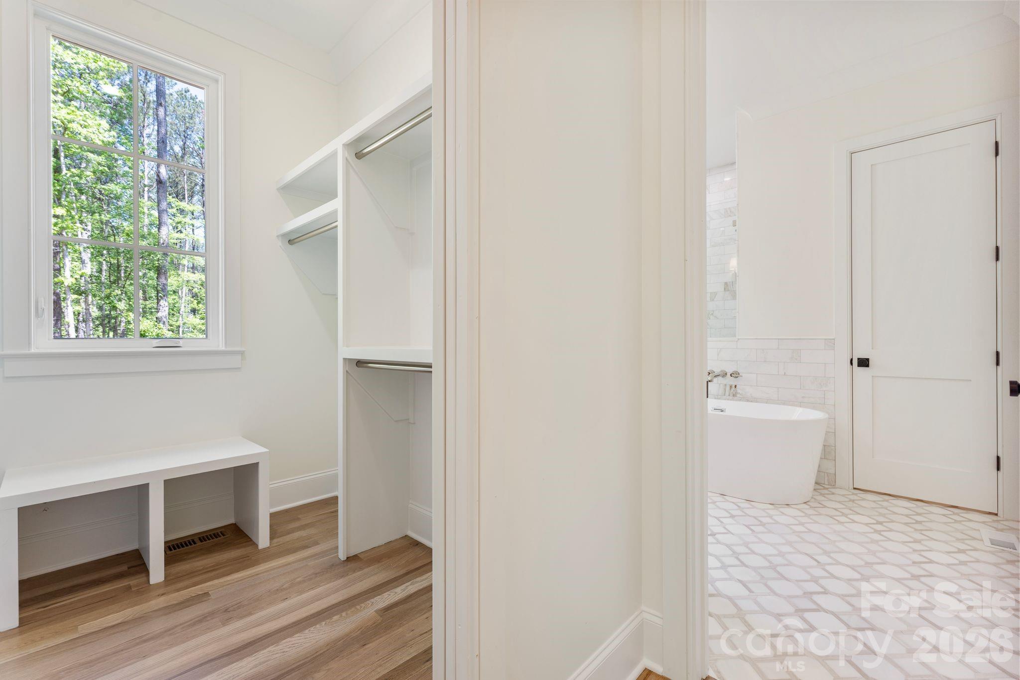 8016 Gulf Crk Road Lancaster, SC 29720 - Photo 30 of 48 a view of a bedroom with wooden floor and windows