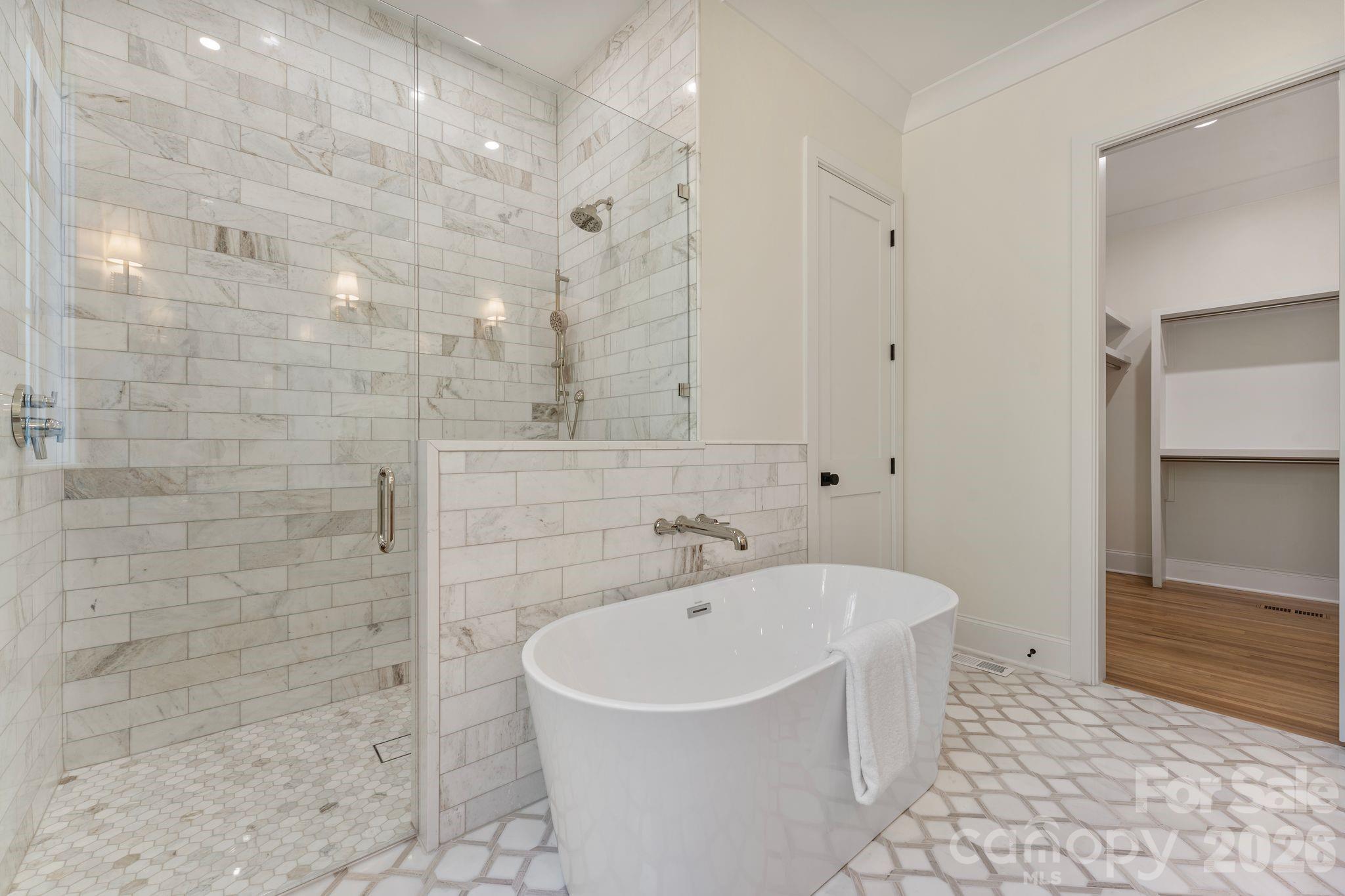 8016 Gulf Crk Road Lancaster, SC 29720 - Photo 33 of 48 a white bath tub sitting in a bathroom and shower