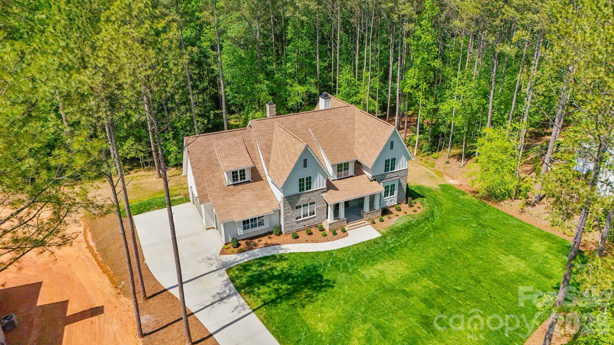 8016 Gulf Crk Road Lancaster, SC 29720 - Photo 5 of 48 front view of a house with a yard