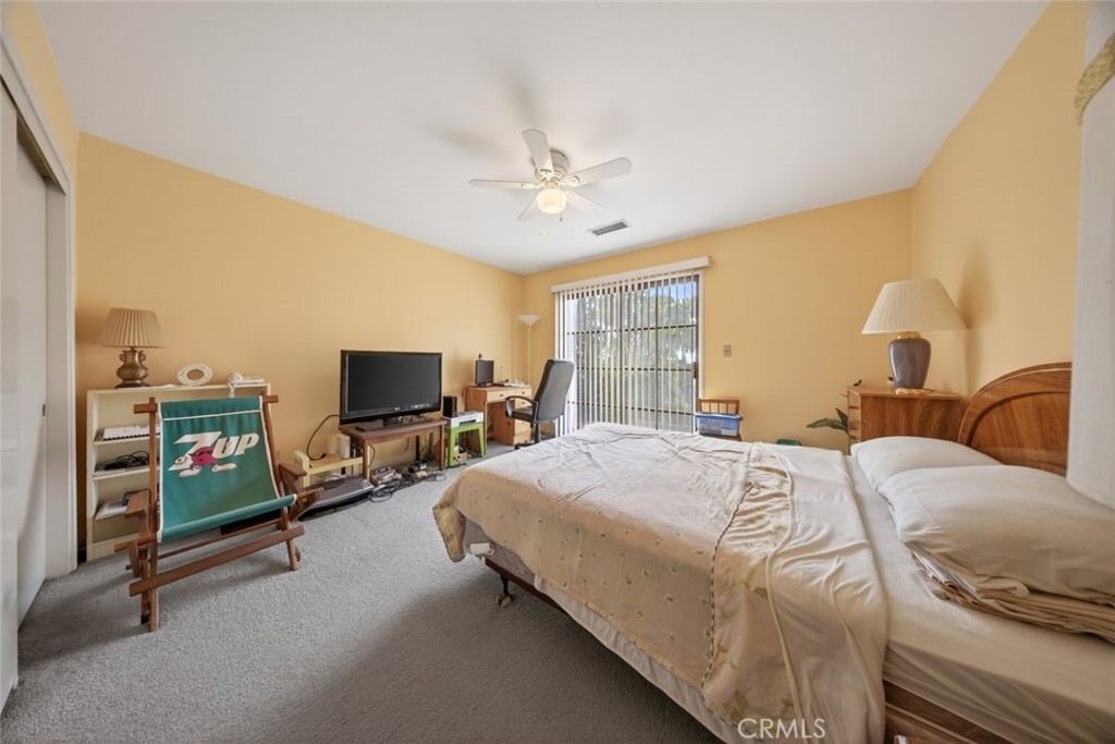 1978 Starvale Road Glendale, CA 91207 - Photo 17 of 75 a bedroom with a bed and a flat screen tv