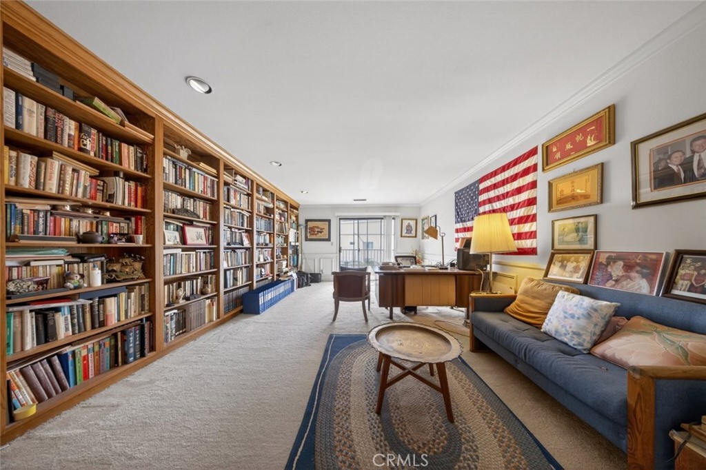 1978 Starvale Road Glendale, CA 91207 - Photo 23 of 75 a living room with furniture a bookshelf and a book shelf