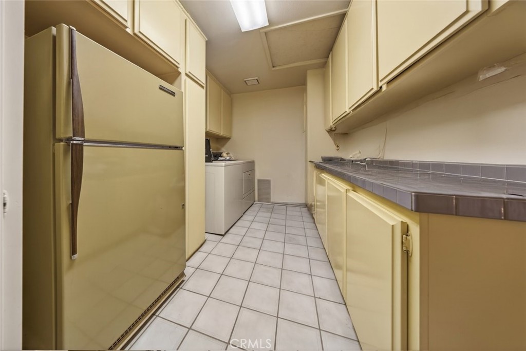 1978 Starvale Road Glendale, CA 91207 - Photo 27 of 75 a bathroom with a granite countertop shower a mirror and a sink